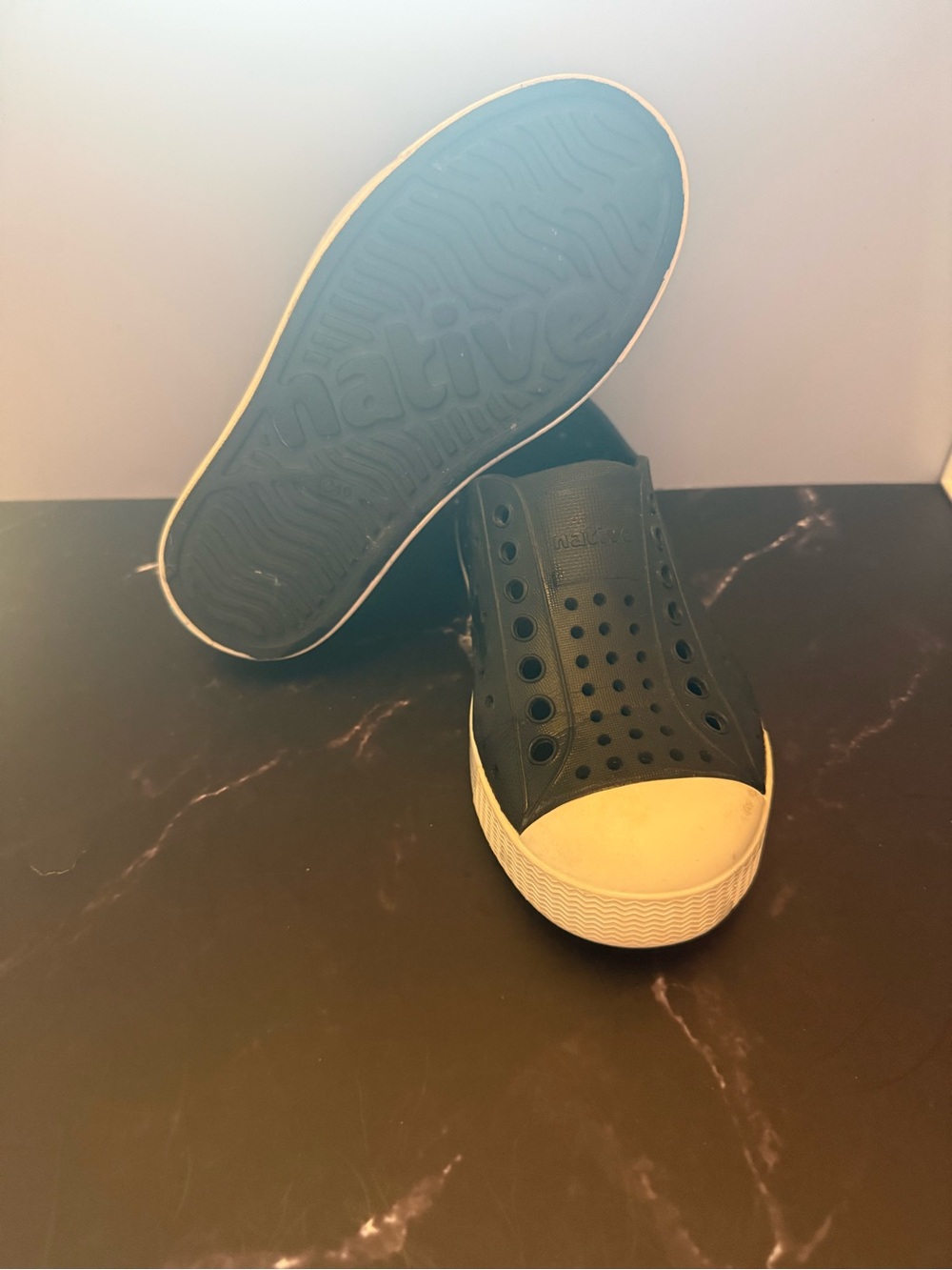Native Jefferson Slip-Ons by Native in Black  with green lightening bolt